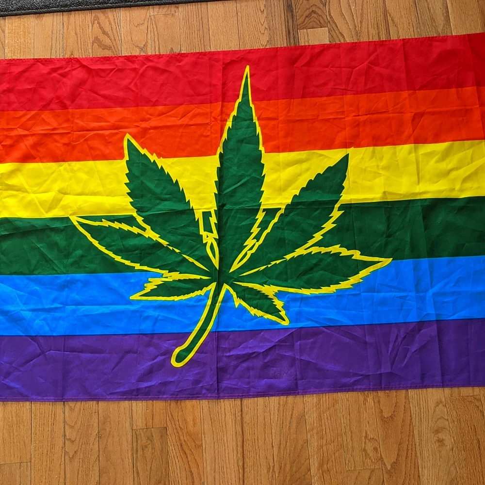 Whimsical pride rainbow marijuana weed flag